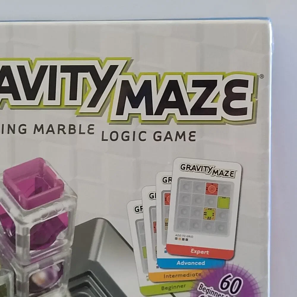 Think Fun Gravity Maze Falling Marble Logic Game Fun